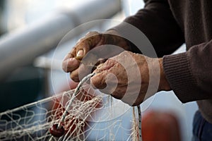 Hands of fisherman photo