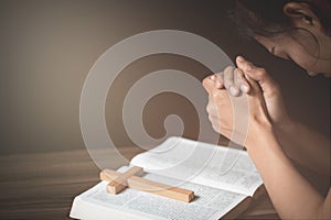 Hands folded in prayer concept for faith, Religious young woman praying to God in the morning, spirtuality and religion, Religious