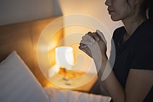Hands folded in prayer concept for faith, Religious young woman praying to God in the morning, spirtuality and religion, Religious