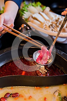 Hands on frame hot pot hotpot szechuan chongqing