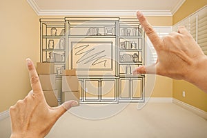 Hands Framing Drawing of Entertainment Unit In Empty Room