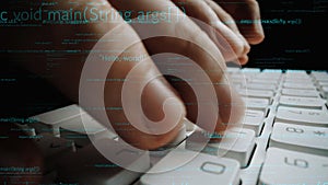 Close-Up View of Hands Typing on a Keyboard with Code Snippets and Programming Syntax in Background for Technology and