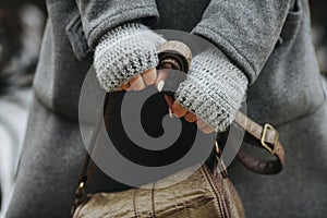 Hands of a girl holding a bag, autumn, spring