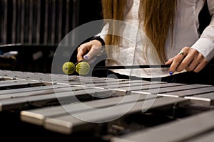 Hands girl playing the vibraphone