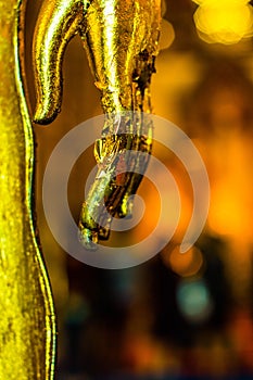 Hands of gold Buddha statue