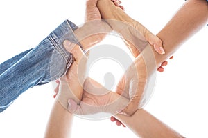 Hands in grabbing and holding wrist together in world unity and peace cooperation background isolated white background with sun