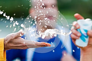 Hands grabbing water