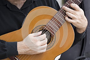 Hands of guitarist photo