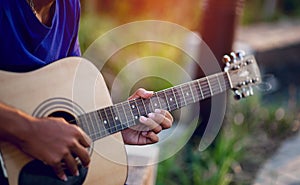 Hands and guitars of guitarists playing guitar concepts, musical instruments