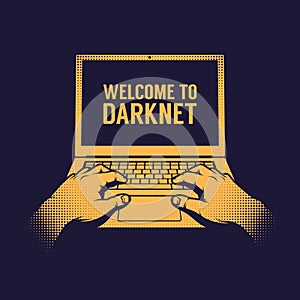 Hands of a hacker entering a darknet on a laptop