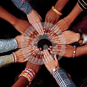 Hands of happy group of African people which stay together in circle happy