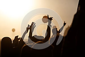 hands of happy people crowd having fun at stage at summer live rock fest