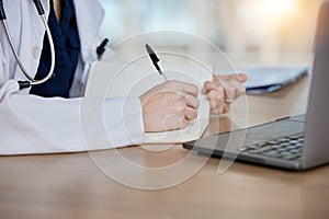 Hands, healthcare and a doctor writing in a notebook while in an office in the hospital for planning. Medical, health or