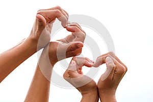 Hands with hearts on a white background isolation, the concept of love and relationships