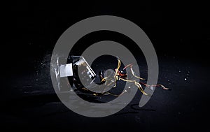 Hands hitting PC power supply on the floor, demolish and break PSU, slow motion photo