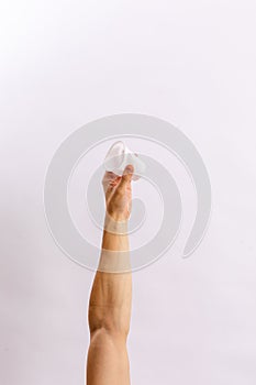 Hands hold trash on a light background. The concept of separate trash, stop plastic, recycling