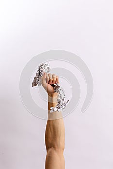 Hands hold trash on a light background. The concept of separate trash, stop plastic, recycling