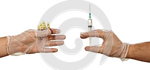 Hands holding ampules with yellow drug and syringe