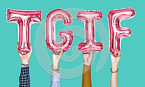 Hands holding balloons spellingthe word TGIF photo