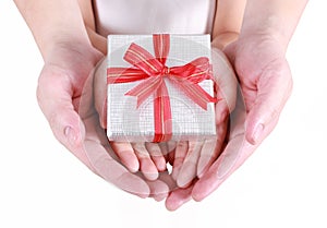 Hands holding beautiful gift box