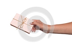 Hands holding a beautiful gift box, woman gives a gift, isolated on white background