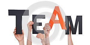 Hands Holding Black Orange Team
