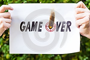 Hands holding burning paper