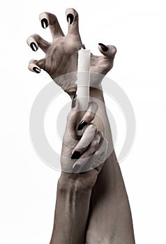 Hands holding a candle, a candle is lit, white background, solitude, warmth, in the dark, Hands death, hands witch