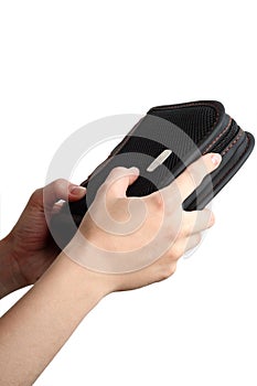 Hands holding CD case