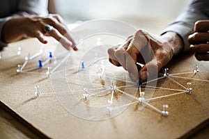 Hands holding connecting pin network