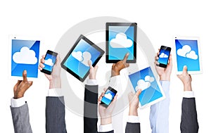 Hands Holding Digital Devices on White Background