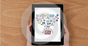 Hands holding digital tablet with new idea icons