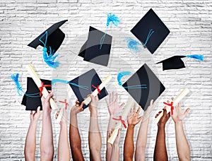 Hands Holding Diplomas And Throwing Hats