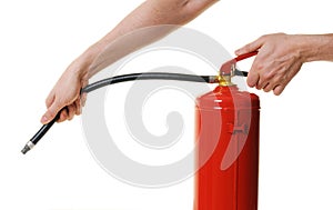 Hands holding fire extinguisher
