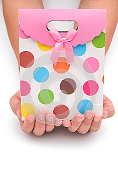 Hands holding a gift box