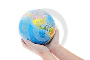 Hands holding globe jigsaw puzzle