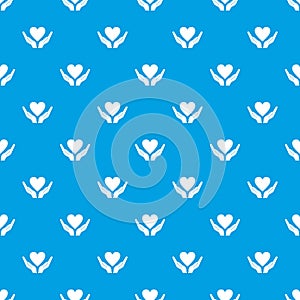 Hands holding heart pattern seamless blue