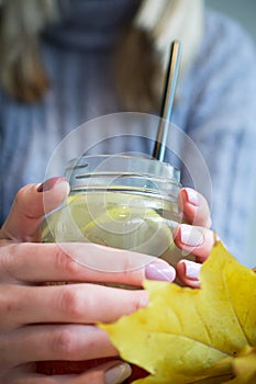 Hands holding hot cup of coffee or tea