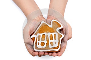 Hands holding house isolated on white background