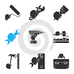 Hands holding instruments glyph icons set