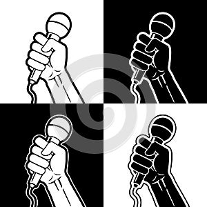 Hands holding microphone in a fist.