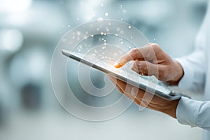 Hands Holding Modern Tablet with Blank Screen Display