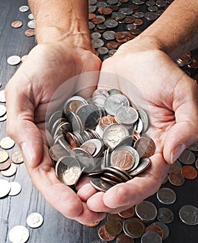 Hands Holding Money Coins