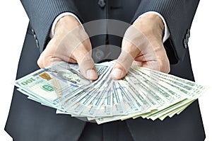 Hands holding money - United States dollar (USD) bills