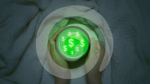 Hands holding a mug filled with dollars and green energy of money. Conceptual photo of growing finance, investment. Image of
