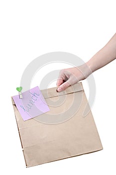 Hands holding paper bag