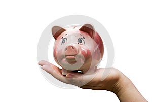 Hands holding piggy bank