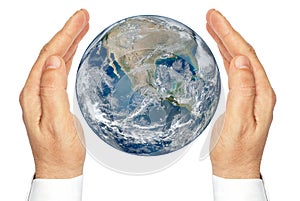 Hands holding the planet Earth isolated on a white background.