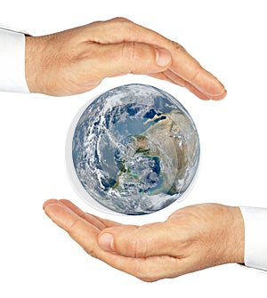 Hands holding the planet Earth isolated on a white background.