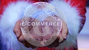 Hands holding planet with text E-commerce